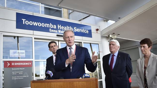 From 2017: Dr John Wakefield Department of Health, speaking back from left; Minister for Health Cameron Dick, Health Services board chairman Mike Horan and Chris McMillan from Cancer Council. June 2017