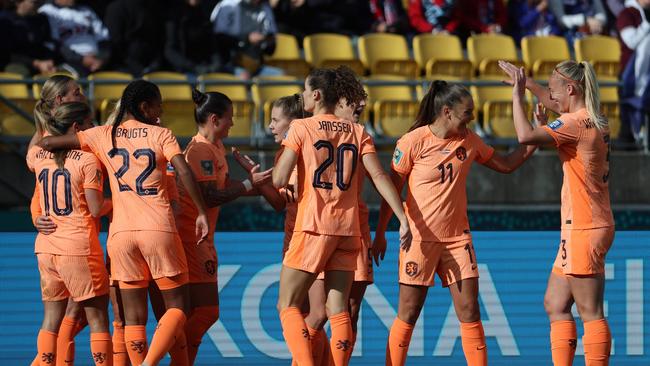 Netherlands' players celebrate their team’s opener against the USA on Thursday. Picture: AFP