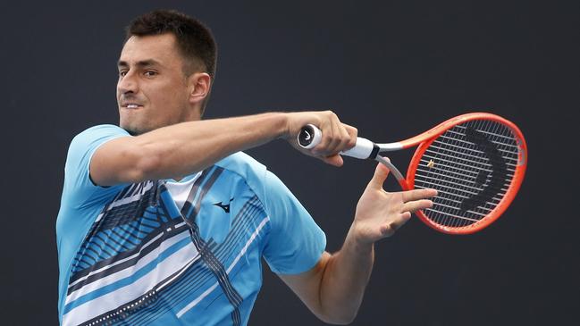 Bernard Tomic in action in Melbourne on Monday night. Picture: David Caird