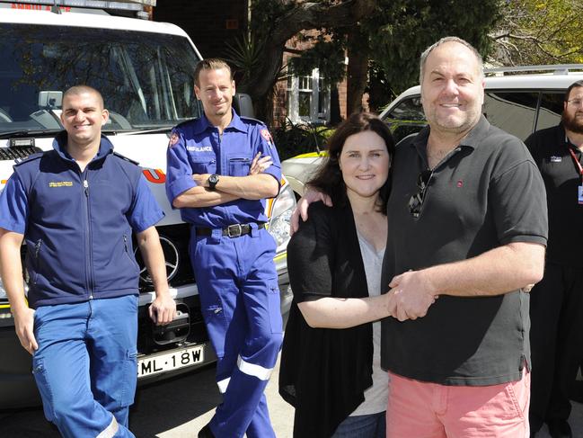 Paramedics Theo Mallos and Benjamin Gilmour with Sarah Walke and partner Donovan Casey after surviving her cardiac arrest in 2014. Picture: Craig Wilson