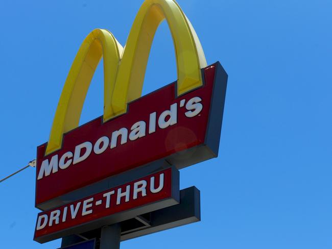 This driver took  Drive-thru to a new level by taking out a fence and set of traffic lights at McDonalds in Alice Springs around noon on Friday...Picture: PHIL WILLIAMS