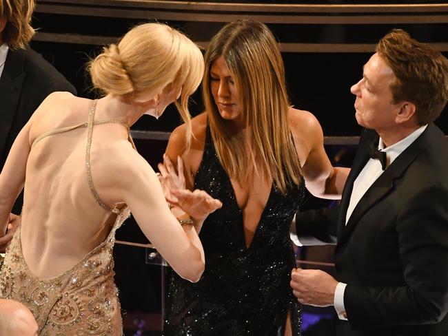 The back was still intact when she chatted to Jennifer Aniston inside the Dolby Theatre. Picture: Getty Images