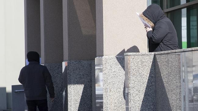 Fahed and Tracy Elniz after a previous Hobart Magistrates Court hearing.