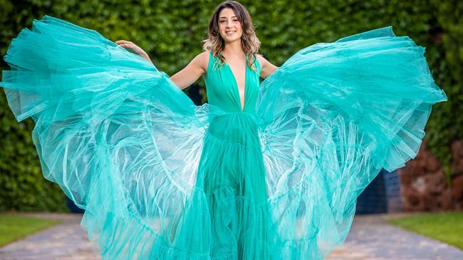 Maddison Bijelic shows off a bright Jason Grech gown. Picture: Jake Nowakowski