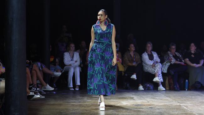 A model wears a Shannon Brett & Bana Yirrji Art Centre design at the Cairns Indigenous Art Fair fashion performance, Woven, held at the Tanks Arts Centre, Edge Hill. Picture: Brendan Radke