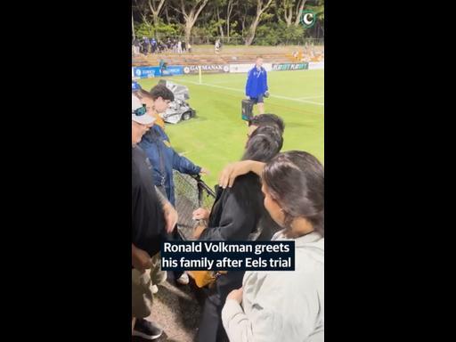 Ronald Volkman greets his family after Eels trial