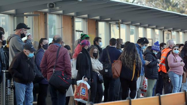 Masks are mandatory when catching public transport. Picture: NCA NewsWire / David Crosling