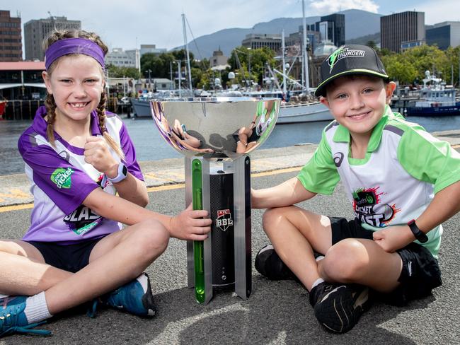 Hobart Hurricanes fan Frankie Mountney with Sydney Thunder fan Julian Cashman before the Big Bash final. Picture: Linda Higginson