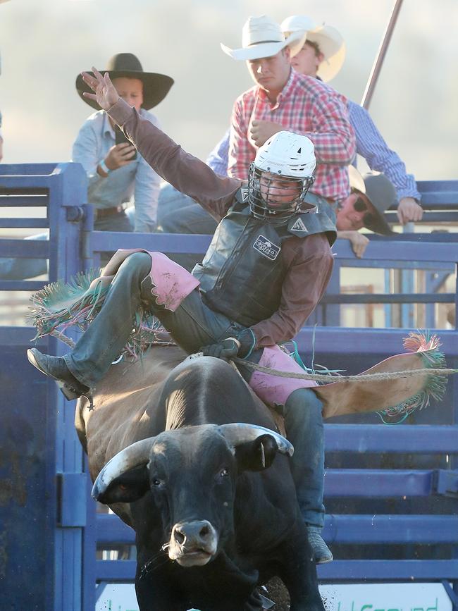 Matty Ahern, 16, from Rockhampton QLD competing in the 2nd Division Bull Ride. Picture: Yuri Kouzmin