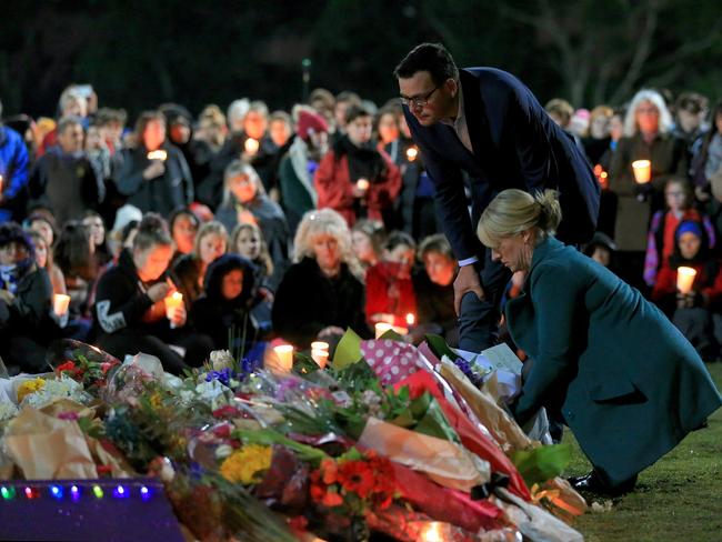 Dan and Catherine Andrews pay their respects at the Reclaim Princes Park vigil for Eurydice Dixon. Picture: Mark Stewart