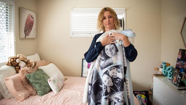 Kellie Postle in her daughter Alyssa's room.