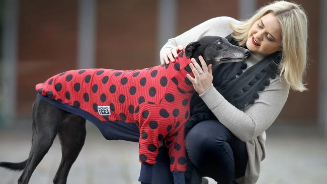 Port Adelaide Enfield councillor Hannah Evans with her adopted greyhound, Bean. Picture: Dean Martin/AAP