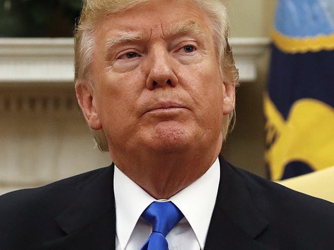 In this July 25, 2017, photo, President Donald Trump sits in the Oval Office of the White House in Washington. Trump is likely to sign a tough new sanctions bill that includes proposed measures targeting Russia _ a remarkable concession that the president has yet to sell his party on his hopes for forging a warmer relationship with Moscow. (AP Photo/Pablo Martinez Monsivais)