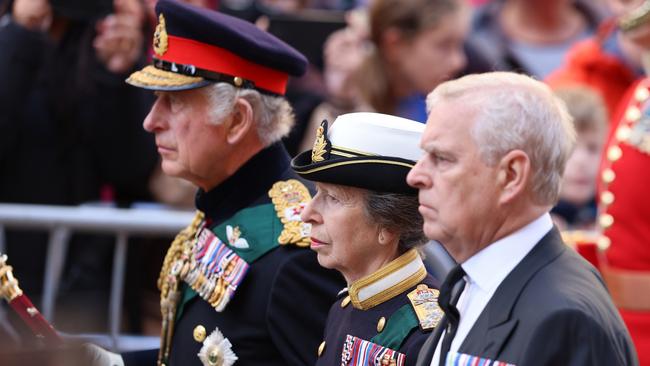 King Charles III, Princess Anne, Princess Royal and Prince Andrew, Duke of York walk behind Queen Elizabeth II's Coffin as it heads to St Giles Cathedral, after making its way along The Royal Mile in Edinburgh, Scotland.