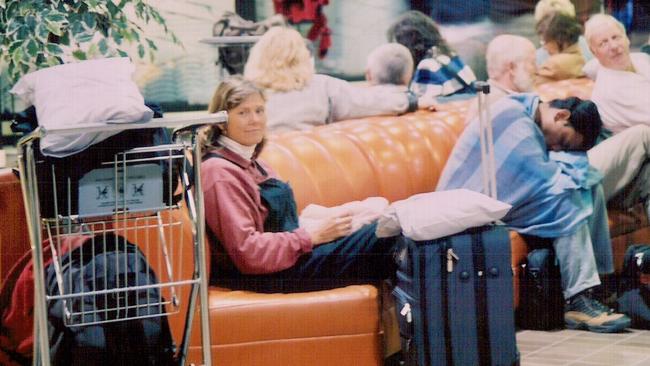 Julia Campbell at Gander Airport and ready to go home after their flight was diverted due to 9/11.