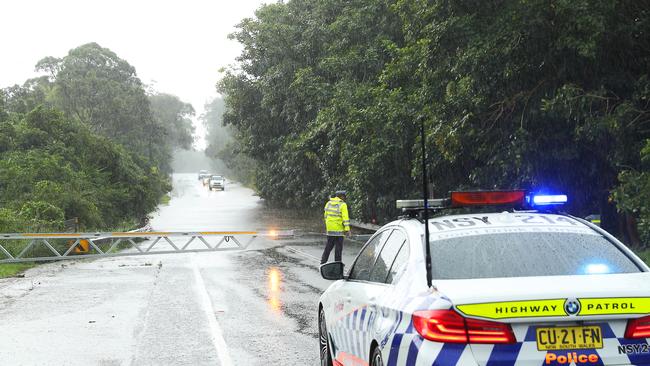 Flooding on the Wakehurst Parkway forced police to close the road. Picture John Grainger