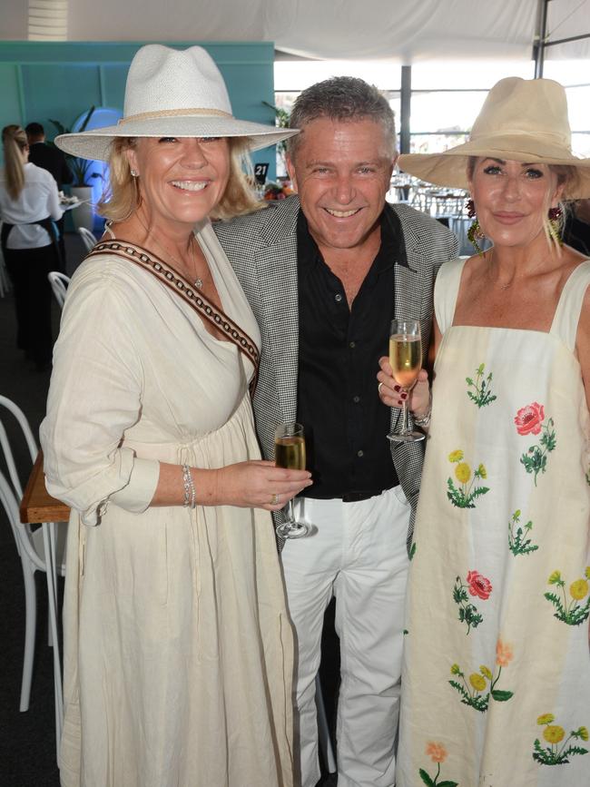 MAGIC MILLIONS 2022: Rebecca and Brett Frizelle with Tania Meli at Pacific Fair Magic Millions Polo at Main Beach. Picture: Regina King