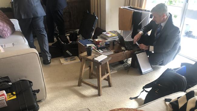 Federal police going through Annika Smethurst’s home in Canberra. Picture supplied