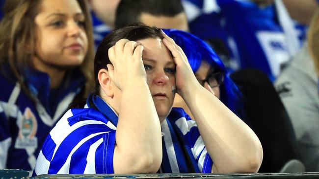 NRL Grand Final, Canterbury Bulldogs v Melbourne Storm at ANZ Stadium, Sydney Olympic Park. A Bulldogs fan in tears.