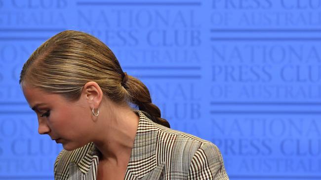 Grace Tame on stage at the National Press Club, where she called for a definition of consent to be established federally and taught in schools as early as possible. Picture: Sam Mooy/Getty Images