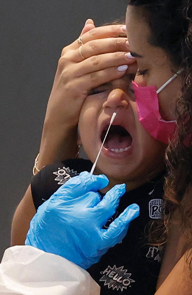 Israeli child undergoes an antigen test in order to visit the LEGO Space Park exhibition in Tel Aviv on August 19. Picture: Jack Guez/AFP