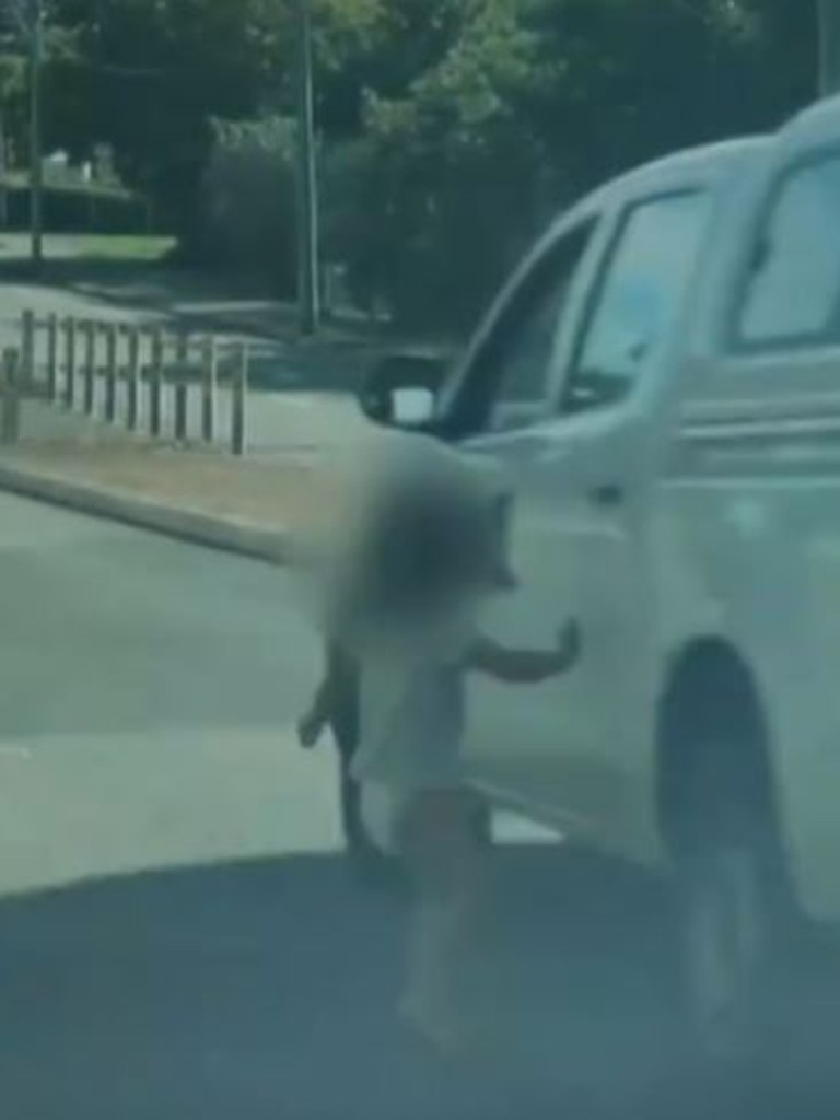 She comes within centimetres of being struck by a car. Picture: 7NEWS