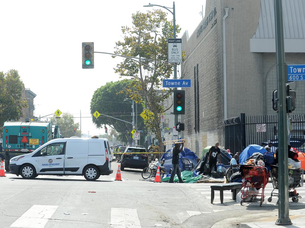 Authorities attempt to remove an encampment in Skid Row. Picture: Jeff Rayner (Coleman-Rayner)