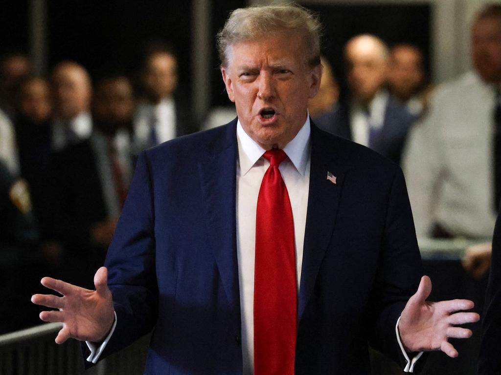 Former US President Donald Trump speaks to reporters as he arrives for the first day of his trial. Picture: Jefferson Siegel / AFP