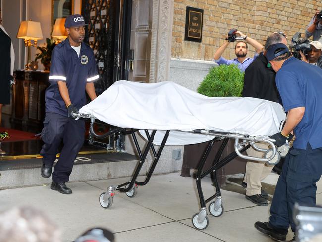 The body of Kate Spade is removed from her Park Avenue  apartment. Picture: MEGA