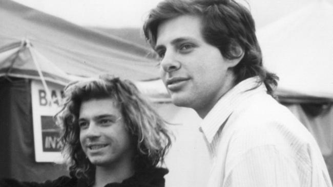 Hutchence with his film director mate Richard Lowenstein backstage at a gig. Picture: Supplied.