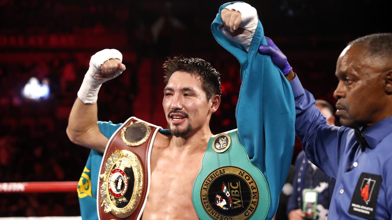 LAS VEGAS, NEVADA - NOVEMBER 20: Janibek Alimkhanuly is declared the winner by referee Kenny Bayless after defeating Hassan N'Dam N'Jikam in a middleweight bout at Michelob ULTRA Arena on November 20, 2021 in Las Vegas, Nevada. Alimkhanuly won the fight with an eighth-round TKO. (Photo by Steve Marcus/Getty Images)