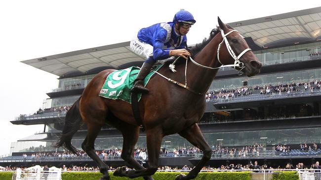 Winx ridden by Hugh Bowman win the TAB Chipping Norton Stakes Race during the TAB Chipping Norton Stakes Day at Royal Randwick racecourse in Sydney, Saturday, Feb. 25, 2017. Their race win today is their 15th consecutive. (AAP Image/David Moir) NO ARCHIVING