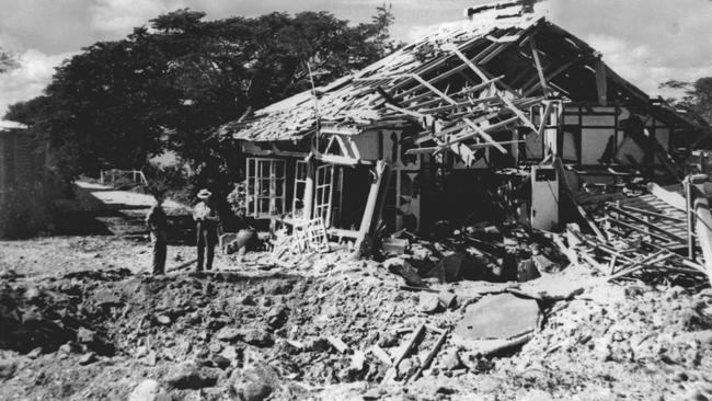 The office used by the NT Administrator, C. L. A. Abbott in the grounds of Government House was bombed during World War II. The bomb crater was only a few feet away from the building under which Abbott, his wife and staff sheltered. 19 February 1942. Picture: Supplied