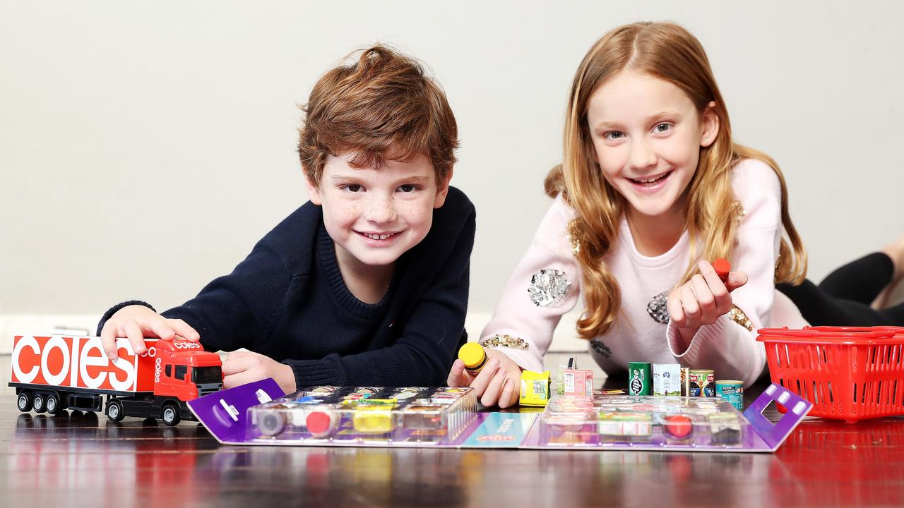 Billy Keating, 5, and Ava Keating, 9, with the new Coles Mini Collectables. Picture: Tim Hunter.