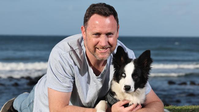 Tally the Border Collie puppy with owner Allan Beare on Burleigh headland. Border Collie's are the fourth most popular dog on the Coast. Picture Glenn Hampson