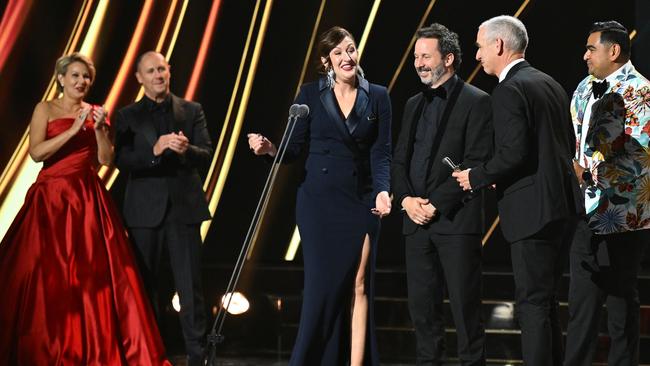 Dilruk Jayasinha, Dave Lawson, Celia Pacquola and Rob Sitch accept the Logie Award for Best Scripted Comedy Program. Picture: Getty