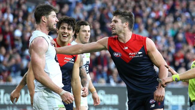 Sam Rowe and Jesse Hogan clash earlier in the season. Picture: Wayne Ludbey