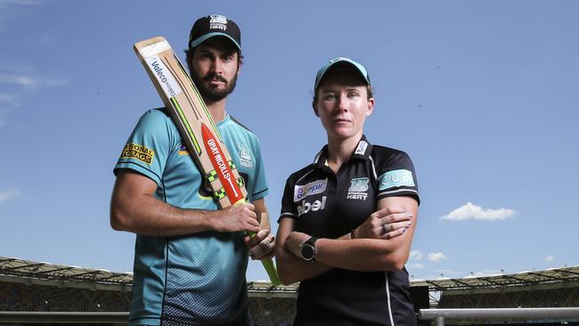 Brisbane Heat’s Ben Cutting and Beth Mooney ahead of Saturday’s must win matches. Picture: Mark Cranitch.
