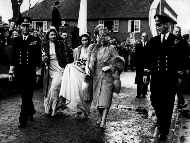 In 1946, Princesses Elizabeth and Margaret were bridesmaids at the wedding of Louis’ daughter Patricia and were photographed walking to the service with their parents and Lieutenant Philip Mountbatten, far right. The end of the war meant the sweethearts could finally spend time together, and Philip’s MG sports car became a familiar sight at Buckingham Palace. In June 1946, he wrote to Elizabeth, apologising for the “monumental cheek” of turning up unannounced. “Yet however contrite I feel there is always a small voice that keeps saying ‘nothing ventured, nothing gained’ — well did I venture and I gained a wonderful time.”