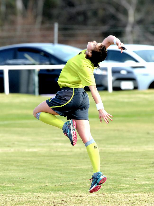 A boundary umpire returns the ball to play in the A Grade Riverland Football League match between Berri and Loxton at Berri Memorial Oval. Picture: BERNARD HUMPHREYS