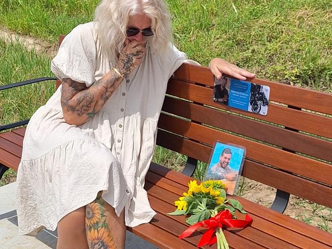 Jessie Rodman's mum Marie Rodman at the memorial bench set up near where the 26-year-old was killed on the Bruce Highway in 2022. Picture: Supplied