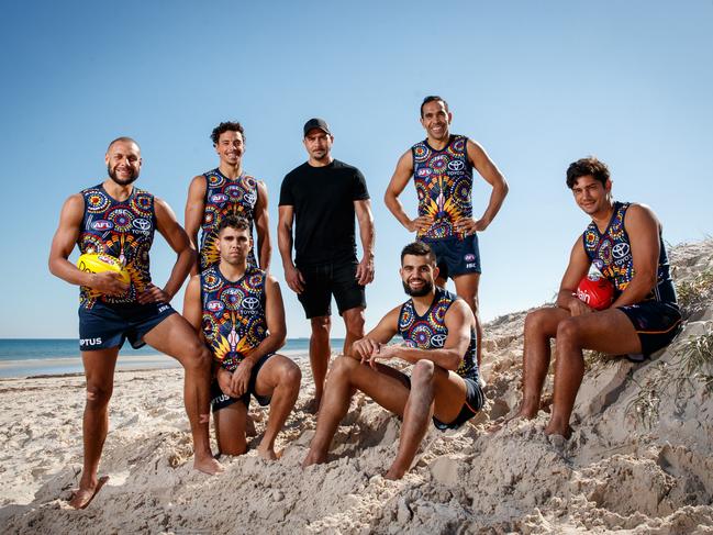 Andrew McLeod designed the Crows 2019 indigenous guernsey. McLeod, centre, is pictured with last year’s players including Cameron Ellis-Yolmen, Ben Davis, Tyson Stengle, Wayne Milera, Eddie Betts and Shane McAdam. Picture: Matt Turner