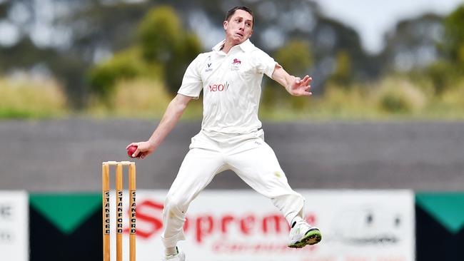 Fitzroy Doncaster's Andrew Perrin broke down with a side strain after 4.3 overs on Saturday. Picture: NIGEL HALLETT