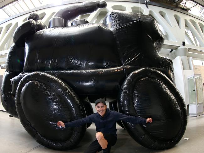 Artist Michael Doolan with his vinyl inflatable titled Once Upon a Time at Inveresk, Launceston, as part of Mofo. PICTURE CHRIS KIDD