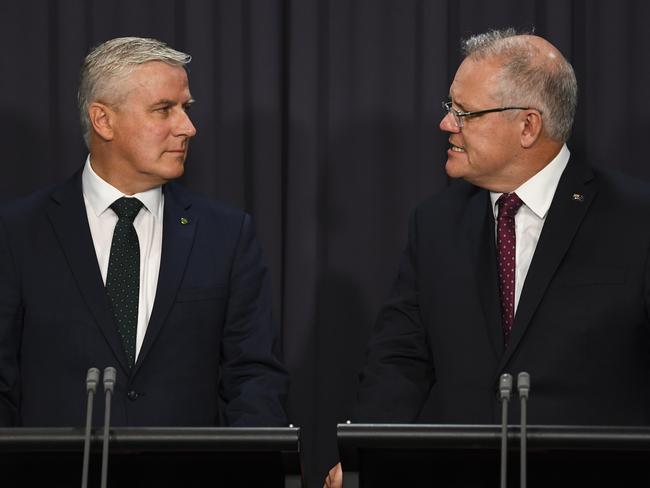 Australian Prime Minister Scott Morrison and Australian Deputy Prime Minister Michael McCormack speak during a press conference at Parliament House in Canberra, Thursday, February 6, 2020. (AAP Image/Lukas Coch) NO ARCHIVING