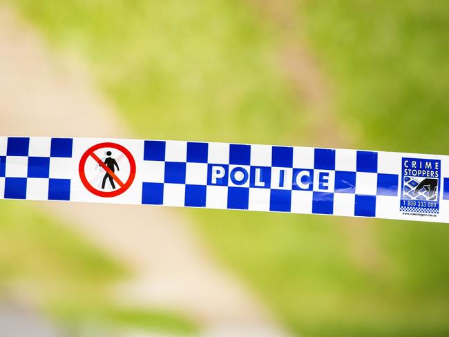 General photograph of Queensland Police and Crime Stoppers tape at crime scene, Sunday, March 8, 2020 (AAP Image/Richard Walker)