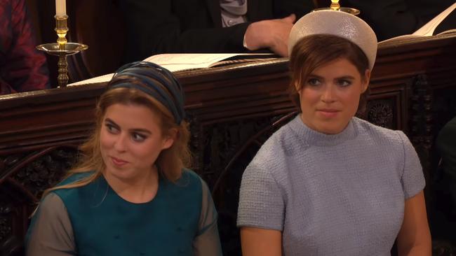 Princess Beatrice and Princess Eugenie react during Bishop Michael Curry's sermon.