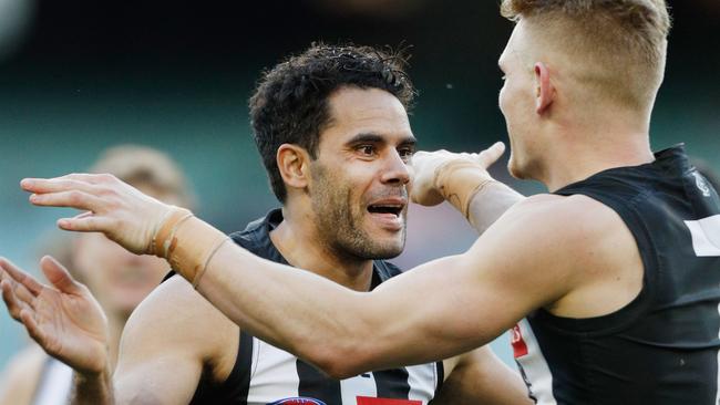 Adam Treloar (right) celebrates a goal with Daniel Wells, who was best afield. Picture: Getty Images