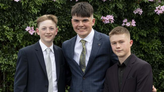 Ziggy Benzko-Greig, Thomas Flint and Blake Lohman pose for a photo at St Paul's Year 10 formal. Picture: Monique Harmer