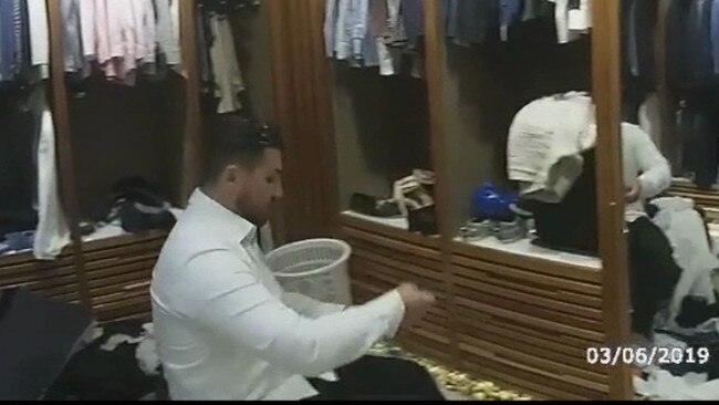 Salim Mehajer gets dressed during his arrest.